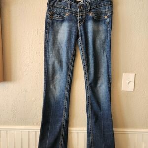Blue Tattoo Super Low Rise Bootcut Jeans